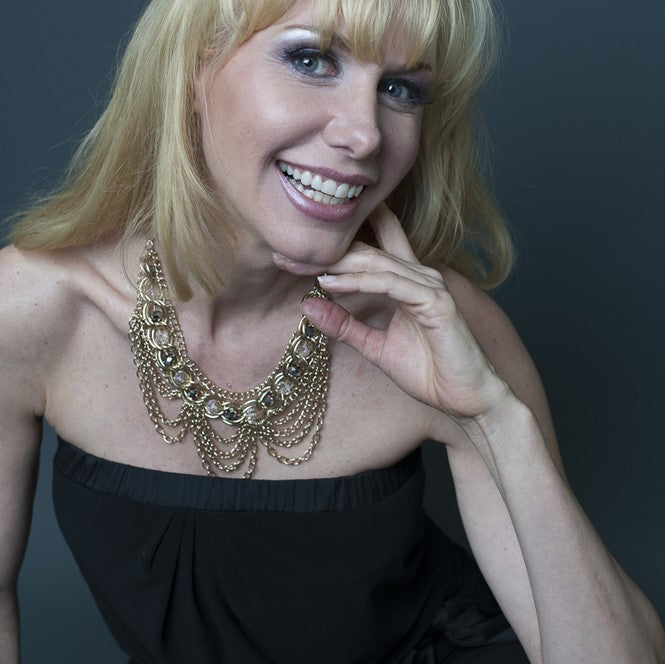 Elegant Gold Tone Crystal Bib Statement Necklace with Draped Chains and Matching Earrings