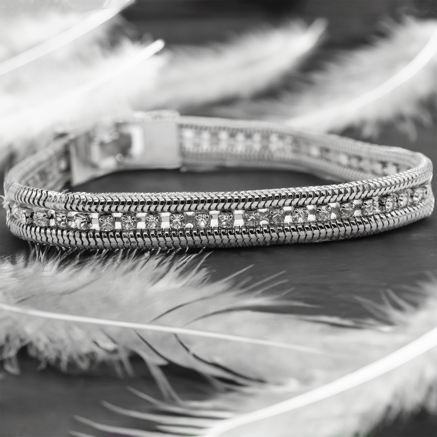 Elegant Silver Tone Tennis Bracelet with Cubic Zirconia Stones and Chain Detail
