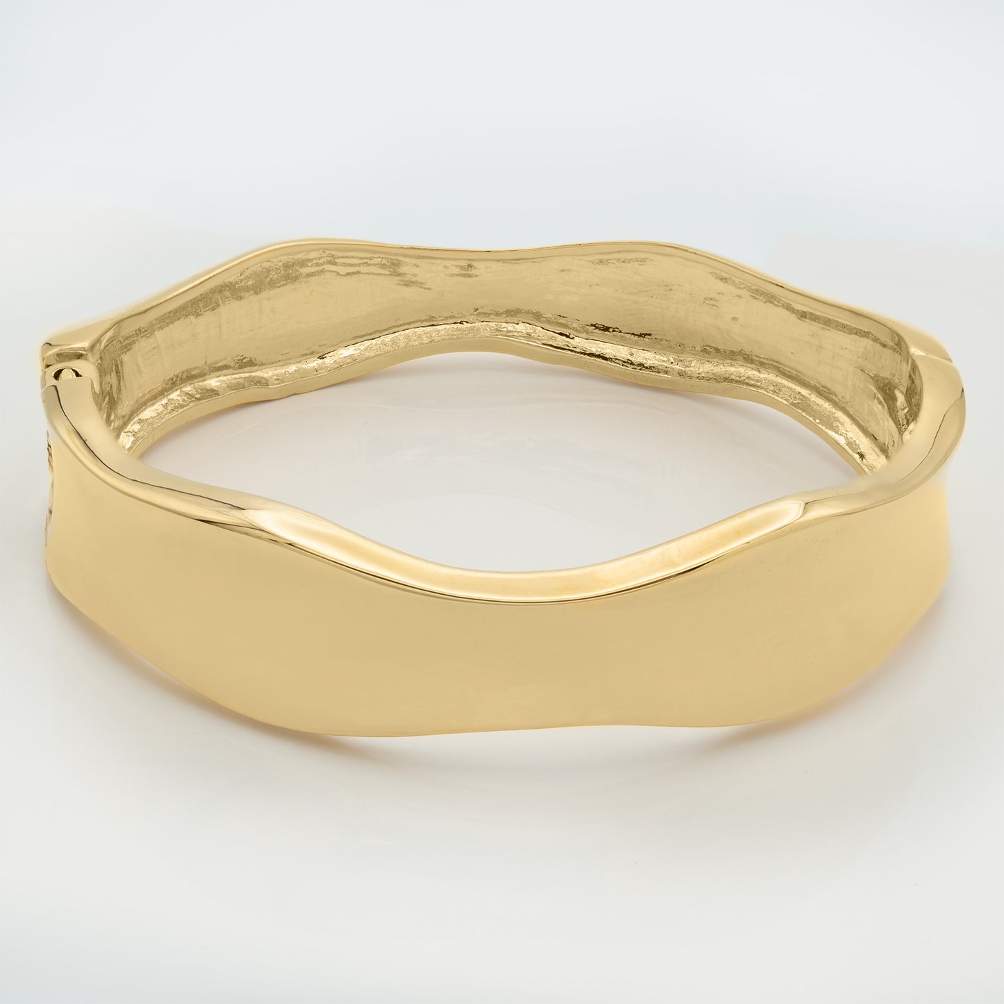 Modern Wavy Gold Tone Hinged Bangle Bracelet with Flowing Design