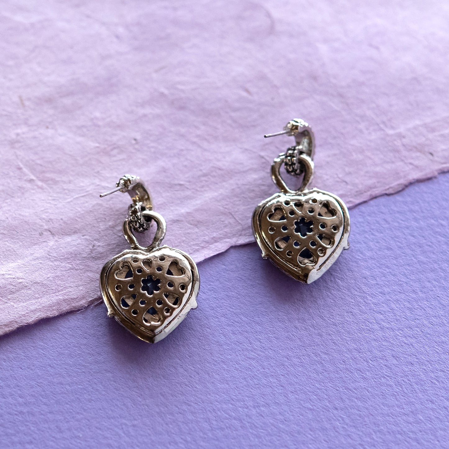 Silver-heart-pierced-earrings-aquamarine-blue-glass-heart-insert-Designer-inspired