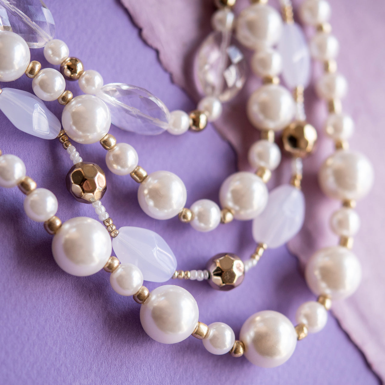 Elegant 5-Strand Pearl Bead Statement Necklace with Crystal Accents and Gold Tone Details