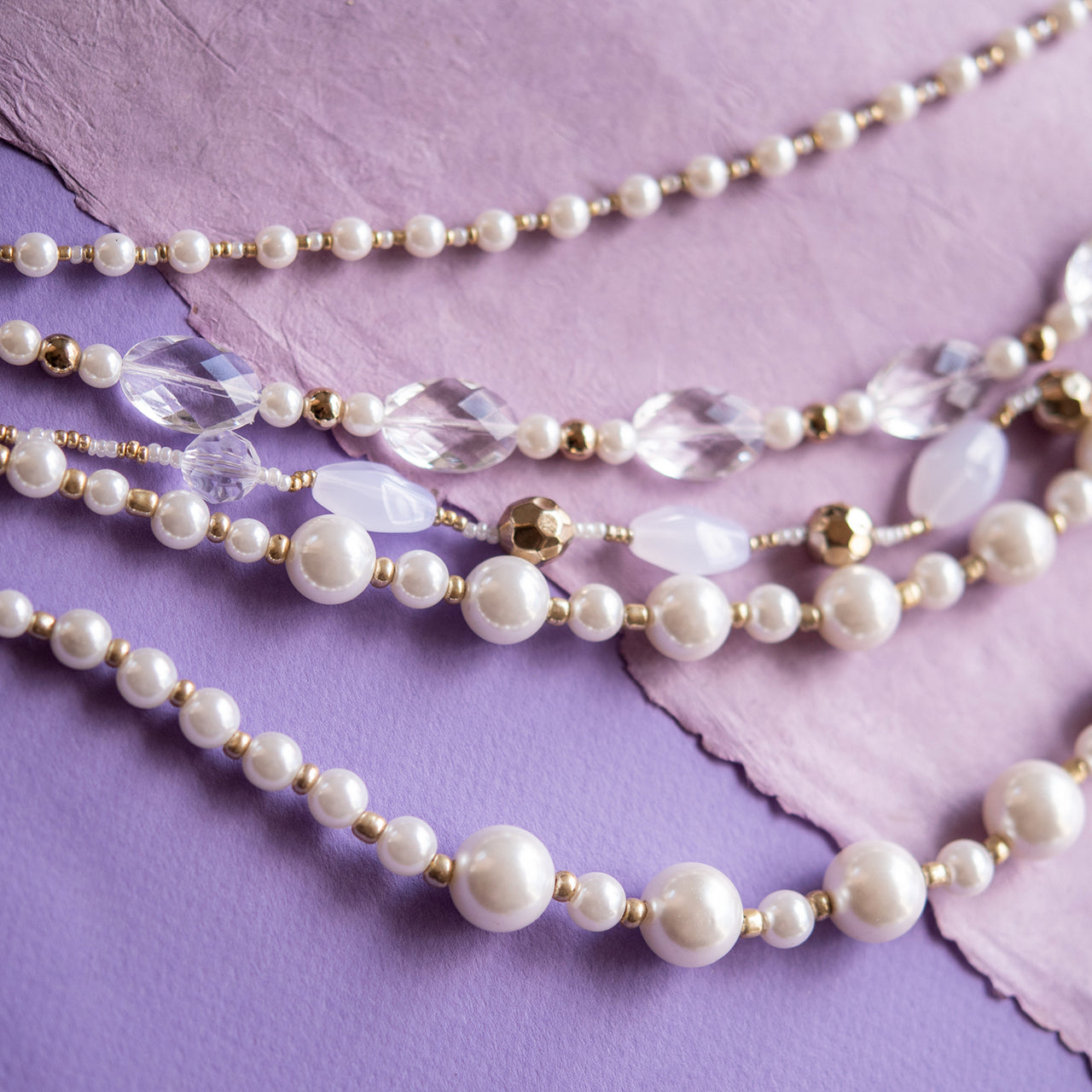 Elegant 5-Strand Pearl Bead Statement Necklace with Crystal Accents and Gold Tone Details