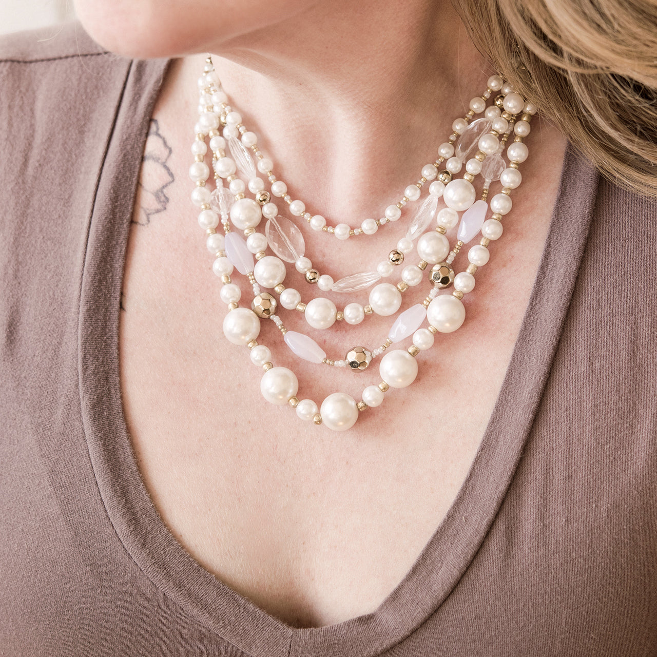 Elegant 5-Strand Pearl Bead Statement Necklace with Crystal Accents and Gold Tone Details