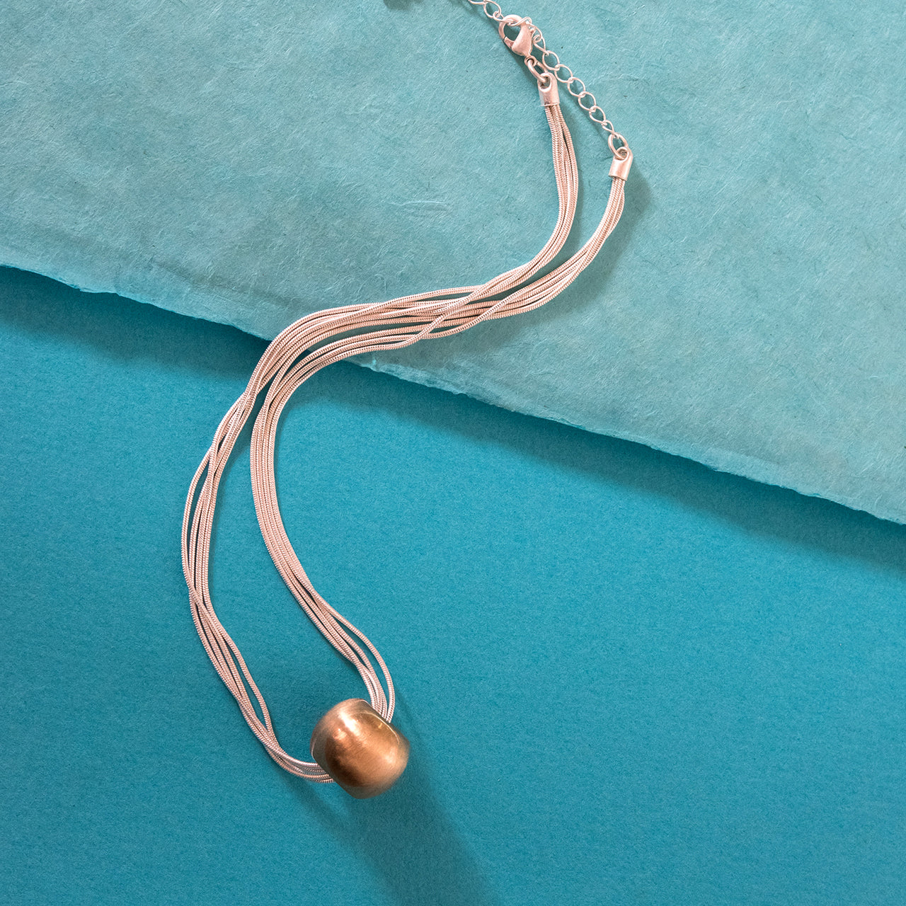 silver-liquid silver-gold-pendant-necklace