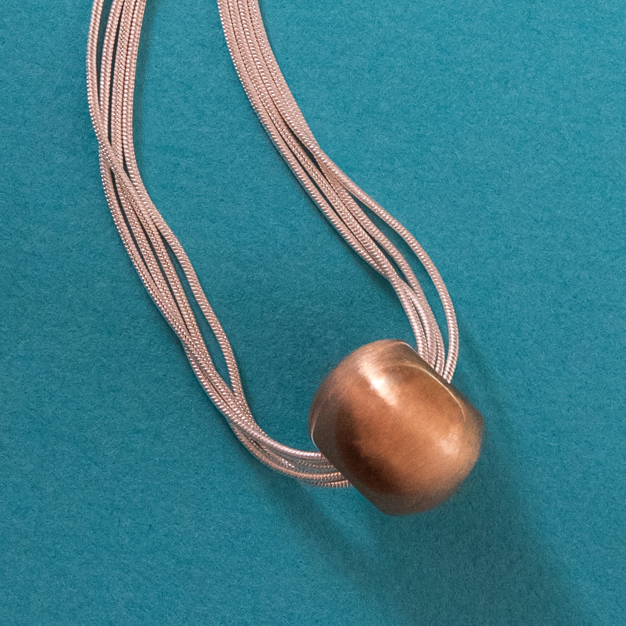 silver-liquid silver-gold-pendant-necklace
