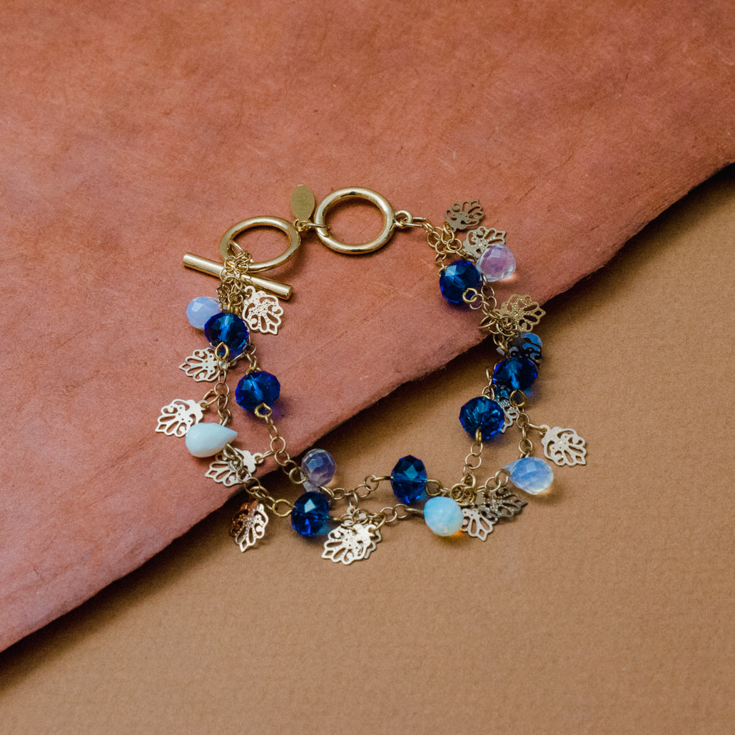Elegant Opal Quartz Bracelet with Blue Glass Beads and Gold Tone Leaf Charms - 8 inch Toggle Clasp