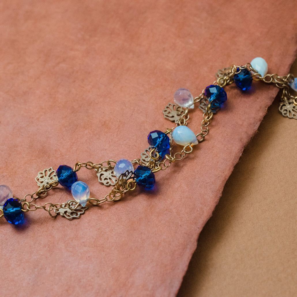 Elegant Opal Quartz Bracelet with Blue Glass Beads and Gold Tone Leaf Charms - 8 inch Toggle Clasp