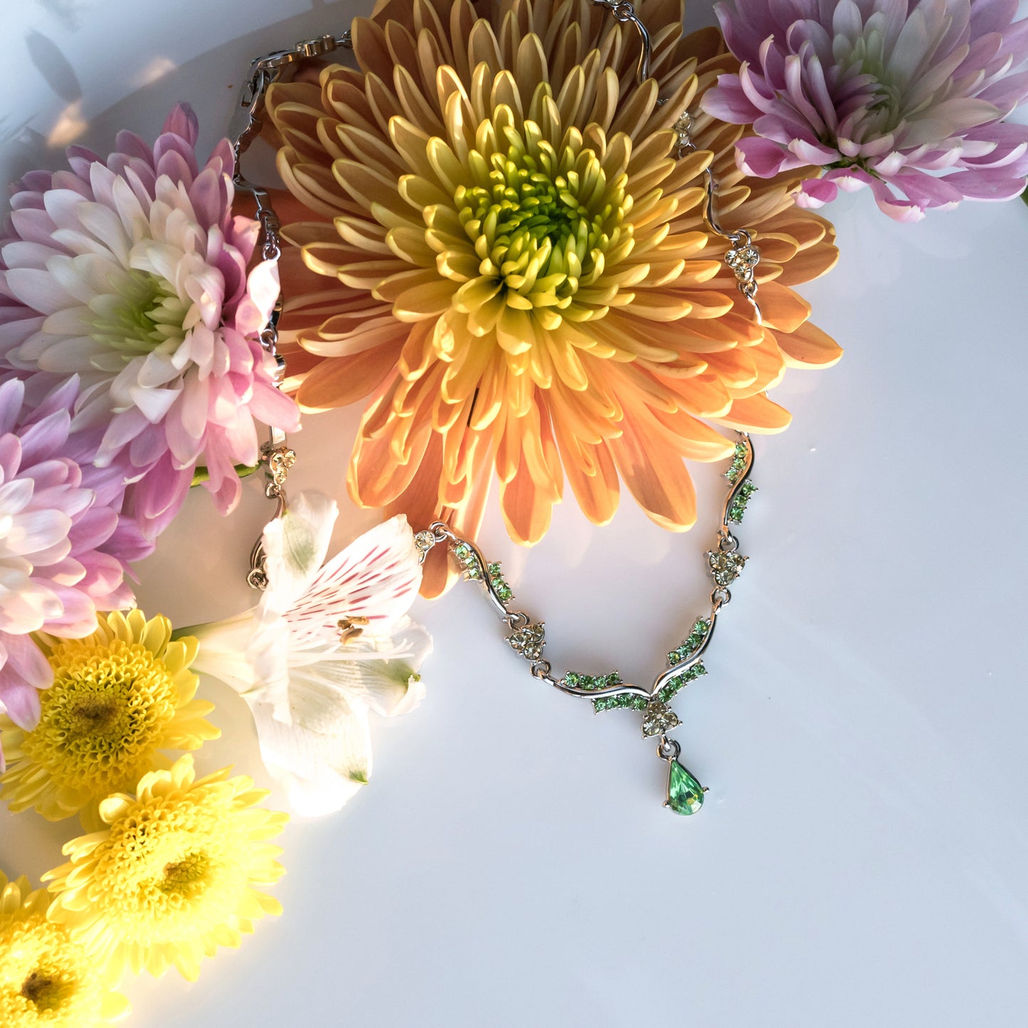 Elegant Crystal Wave Necklace with Green and Yellow Austrian Crystals and Teardrop Pendant, 16 Inch