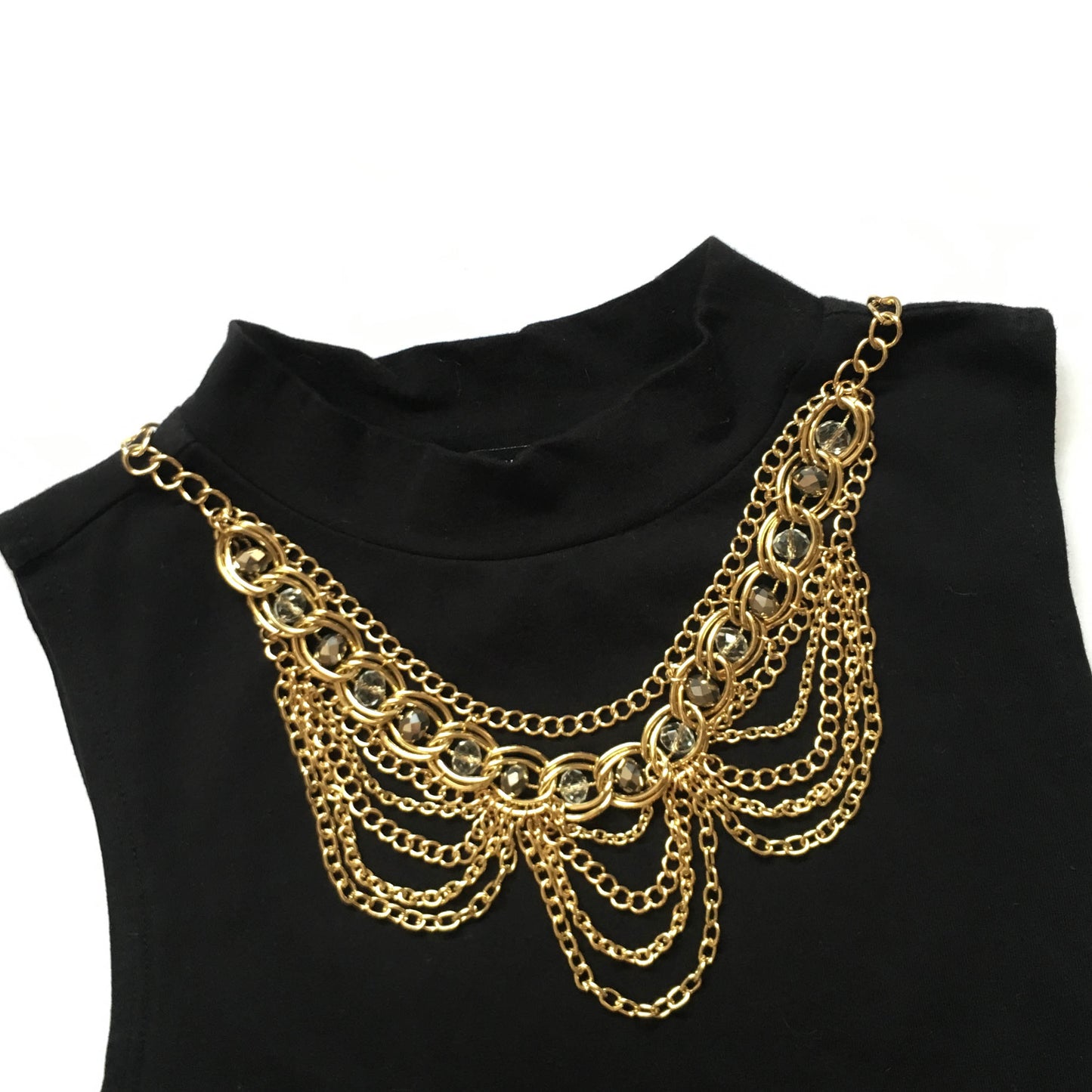 Elegant Gold Tone Crystal Bib Statement Necklace with Draped Chains and Matching Earrings