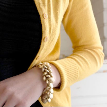 Elegant Gold Tone Beaded Charm Statement Bracelet with Adjustable Length