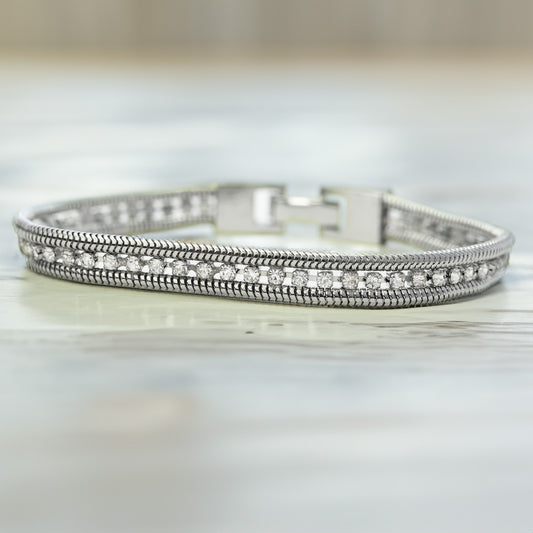 Elegant Silver Tone Tennis Bracelet with Cubic Zirconia Stones and Chain Detail