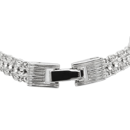 Elegant Silver Tone Tennis Bracelet with Cubic Zirconia Stones and Scroll Chain Detail