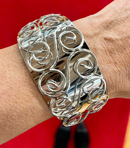 Wide Silver Tone Swirl Pattern Statement Cuff Bracelet with Raised Design